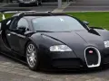 Czarny Bugatti Veyron, symbol luksusu. Zastanawiasz się, ile kosztuje Bugatti Veyron? To marzenie wielu, ale cena jest astronomiczna.