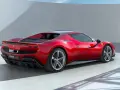 Czerwone Ferrari 296 GTB z bliska. Zastanawiasz się, ile kosztuje nowe Ferrari? Ten model to marzenie każdego fana motoryzacji.