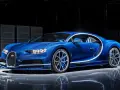 Błękitny Bugatti Chiron, symbol luksusu. Zastanawiasz się, ile kosztuje Bugatti Chiron? To marzenie wielu, ale cena jest astronomiczna.