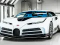 Białe Bugatti Centodieci z niebieskim wnętrzem. Zastanawiasz się, ile kosztuje Bugatti Centodieci? To marzenie wielu fanów motoryzacji.