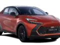 Pomarańczowy Toyota C-HR Hybrid, ciekawy design, niskie spalanie.