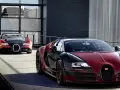 Dwa Bugatti Veyron, jeden czerwono-czarny z napisem "La Finale", gotowe do osiągnięcia 100 km/h.