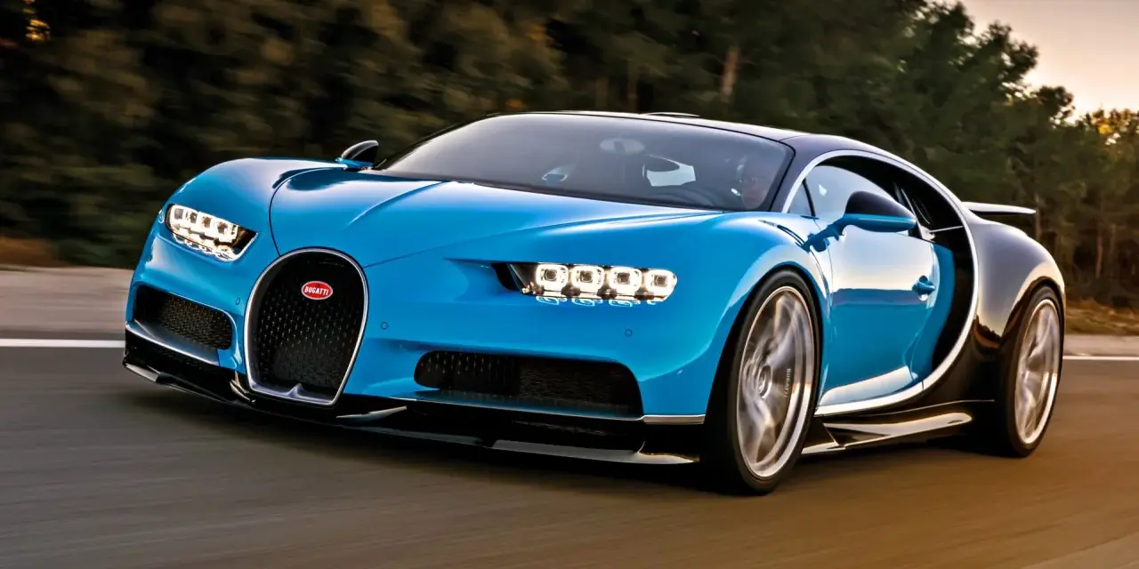 Niebieski Bugatti Chiron pędzi po drodze, budząc podziw mocą 1500 koni mechanicznych.