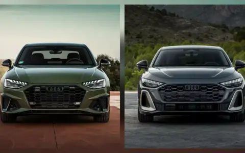 Dwa najnowsze Audi, zielone i grafitowe, prezentują swoje agresywne grille i nowoczesne reflektory.